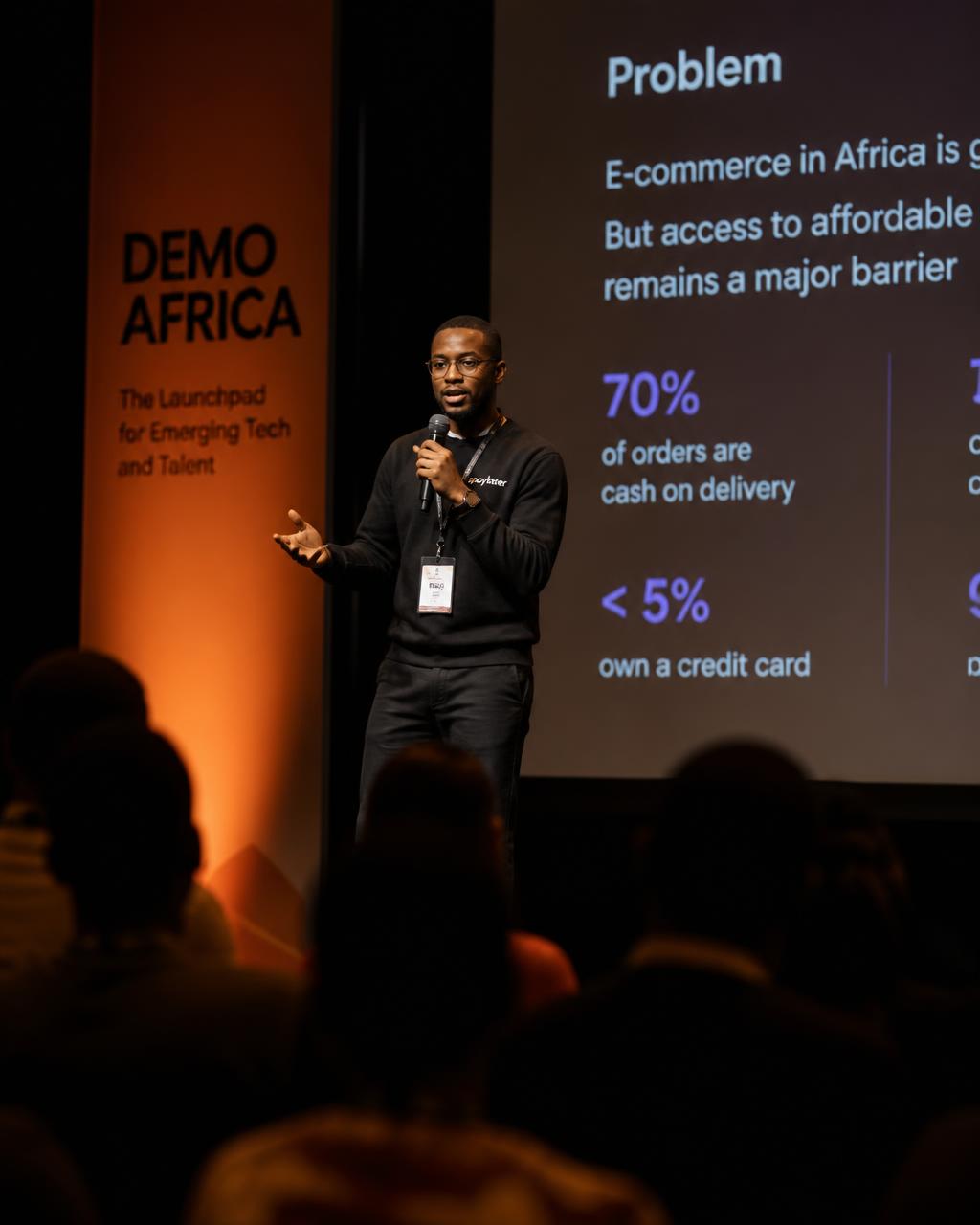African founders pitching their AI venture to an audience at a demo day